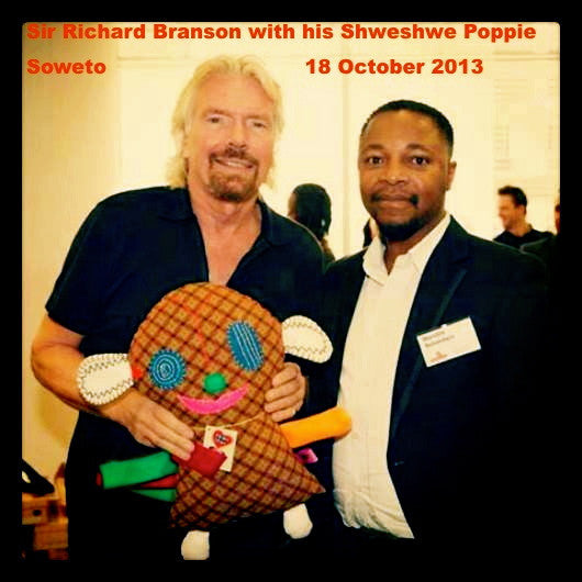 Richard Branson with his ShweShwe Poppis Soweto